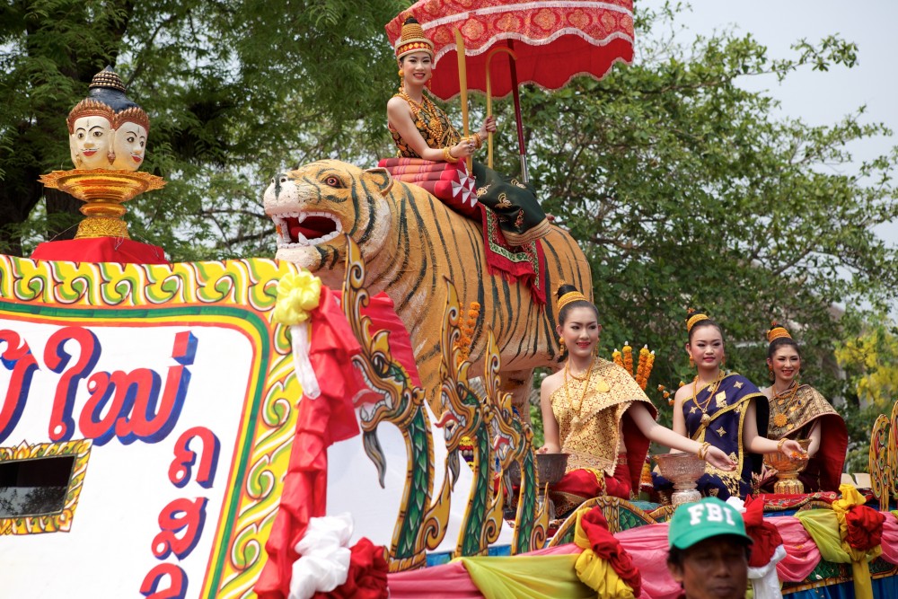 Miss Lao beauty pageant contestants on colorfultiger float at Laos New Year parade in Luang Prabang