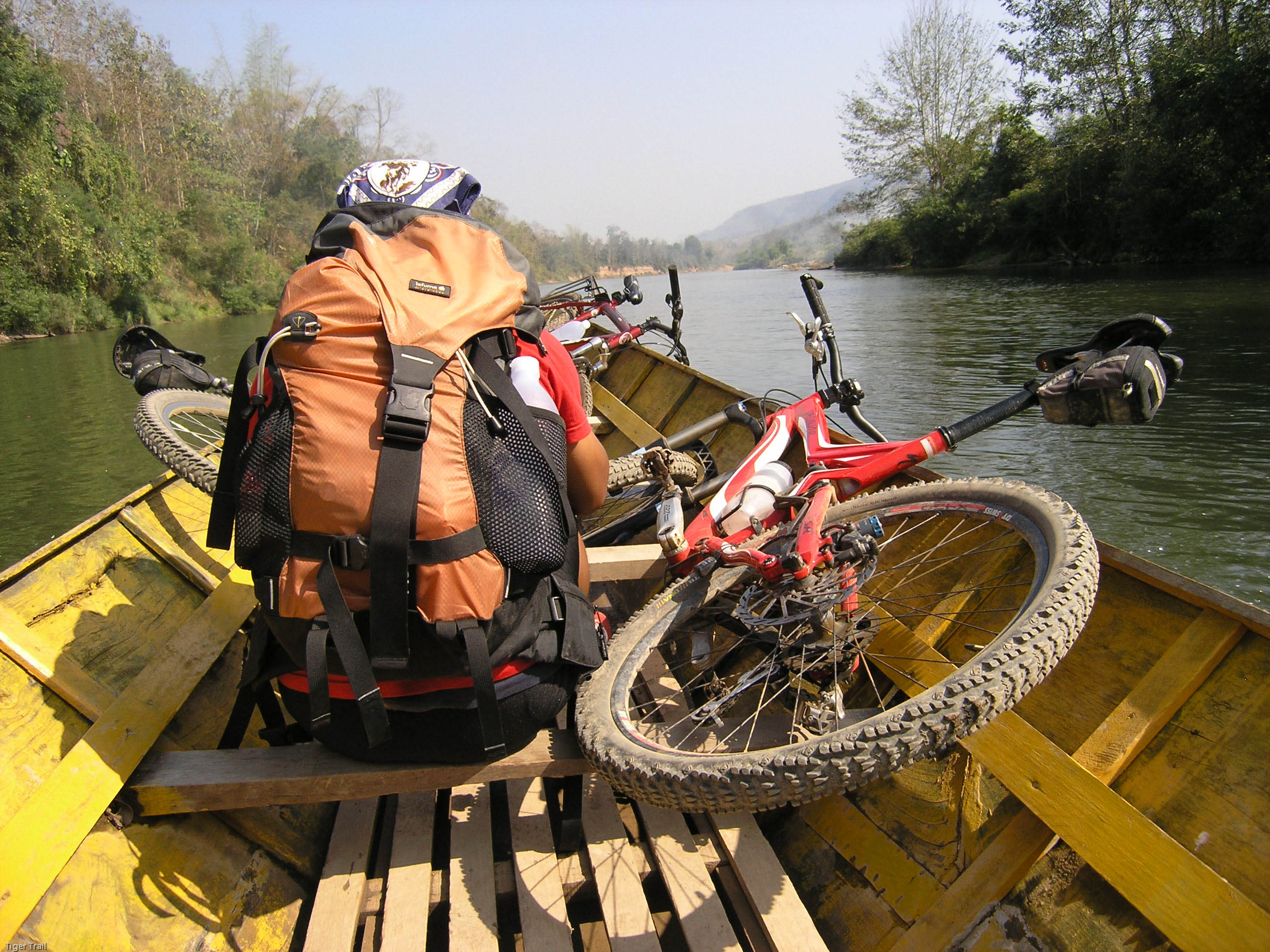 Mountain biking around Laos villages, mountains, and rivers