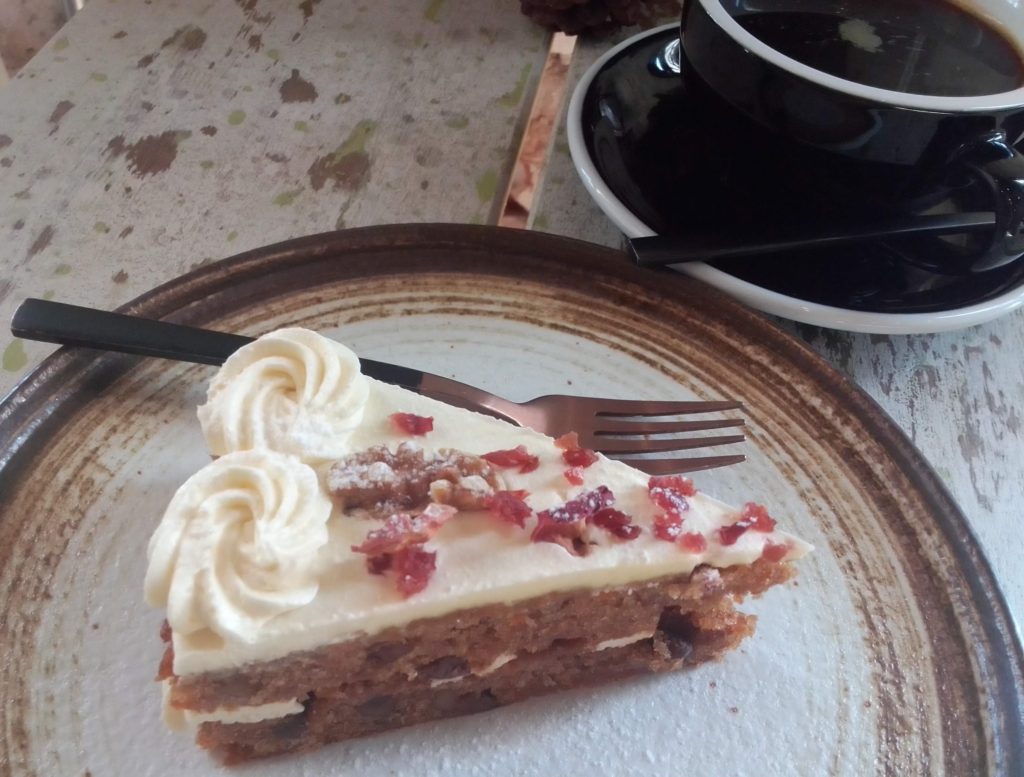 A slice of carrot cake and an Americano make a great afternoon power snack at Formula B in Luang Prabang.