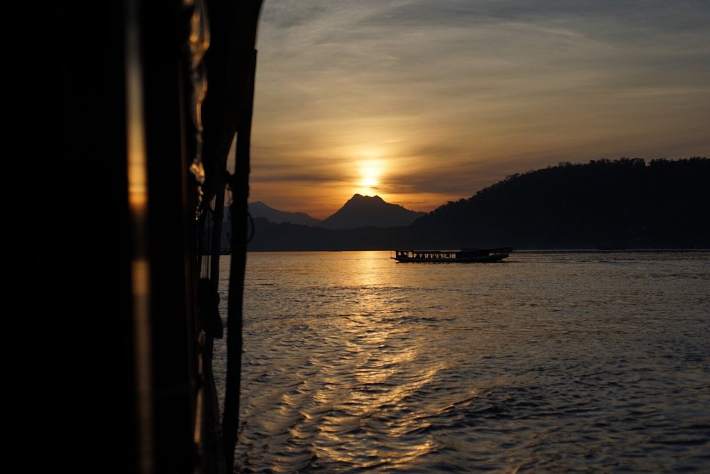 Experience Golden hour on-board Luang Prabang's Nava Mekong Sunset Cruise.